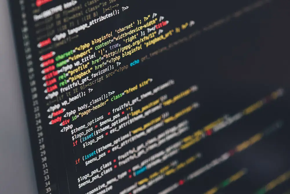 Close-up of website code on a professional development workstation